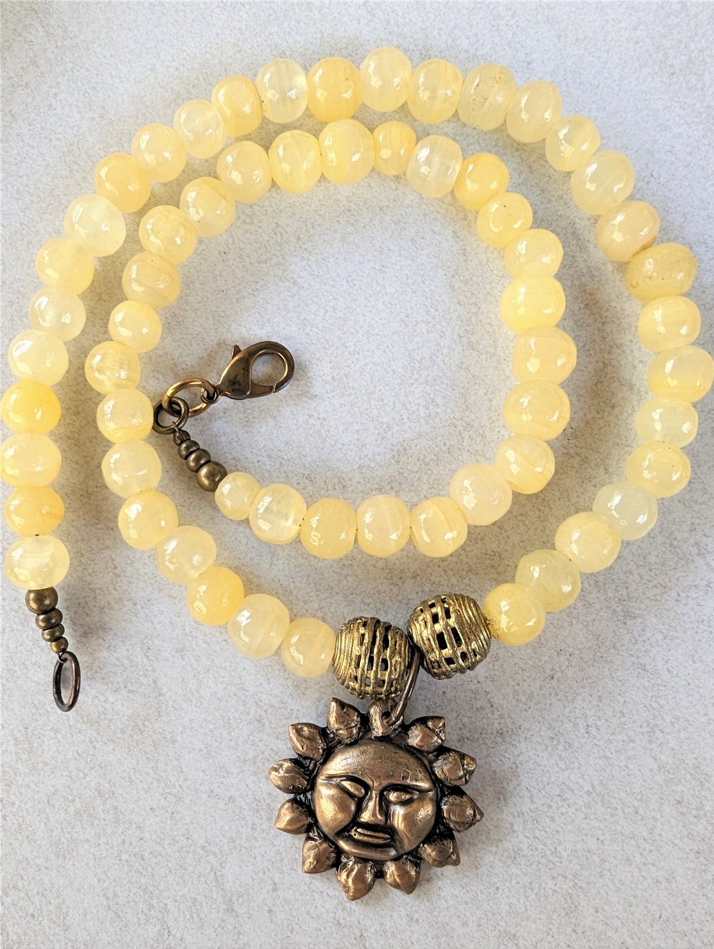 Big Bold Bronze Sun Face Pendant on Vintage Yellow Alabaster Bead Necklace, Bohemian Artisan Statement Necklace