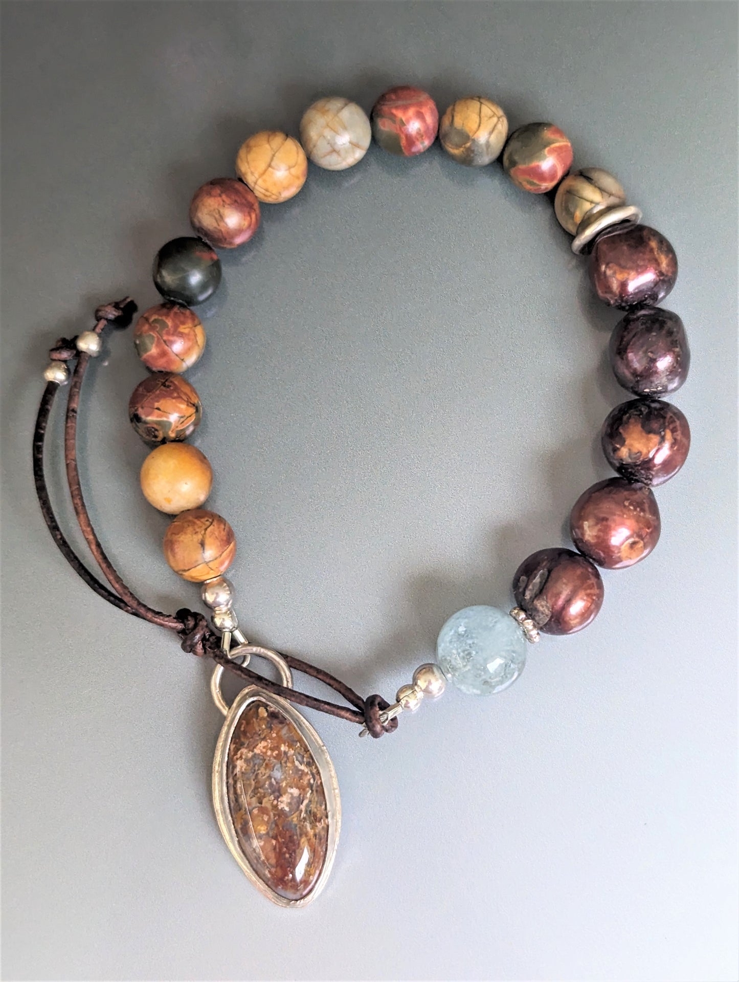Bohemian Red Creek Jasper Bracelet with Brown Pearls and Aquamarine, and Petrified Palm Button and Leather Closure