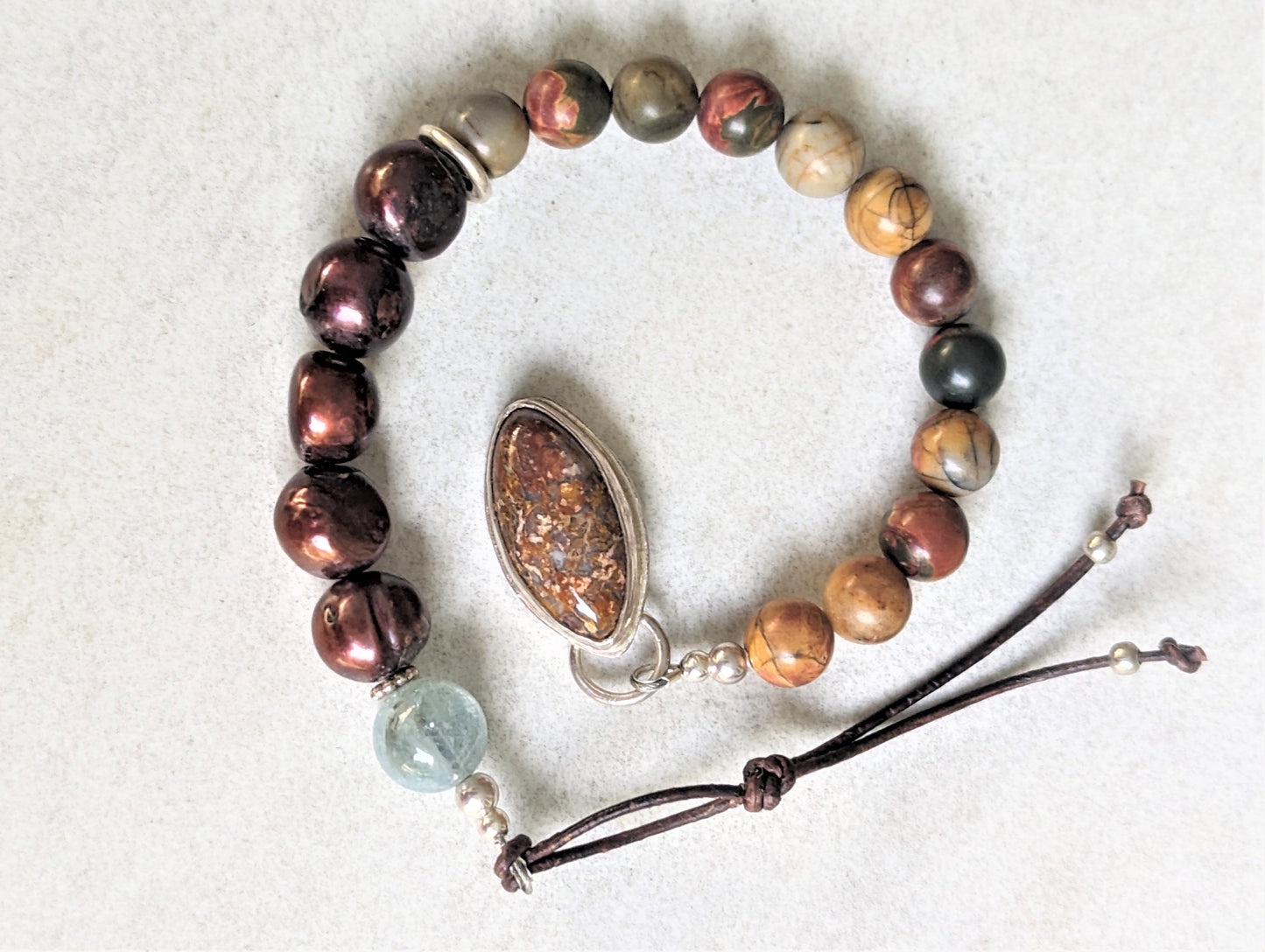 Bohemian Red Creek Jasper Bracelet with Brown Pearls and Aquamarine, and Petrified Palm Button and Leather Closure
