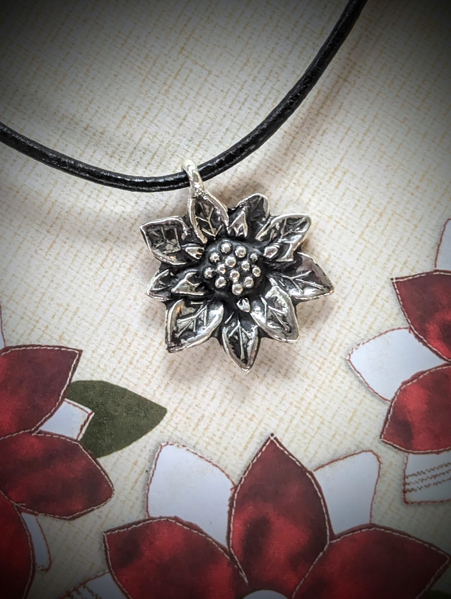 Holiday Silver Poinsettia Pendant on Leather Cord