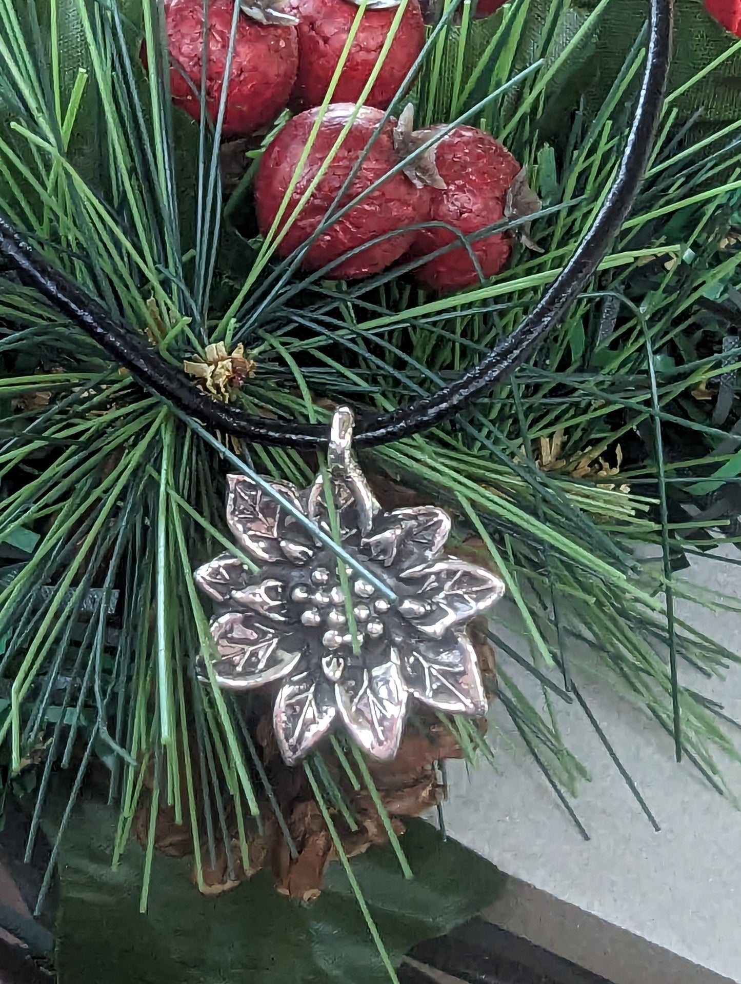 Holiday Silver Poinsettia Pendant on Leather Cord