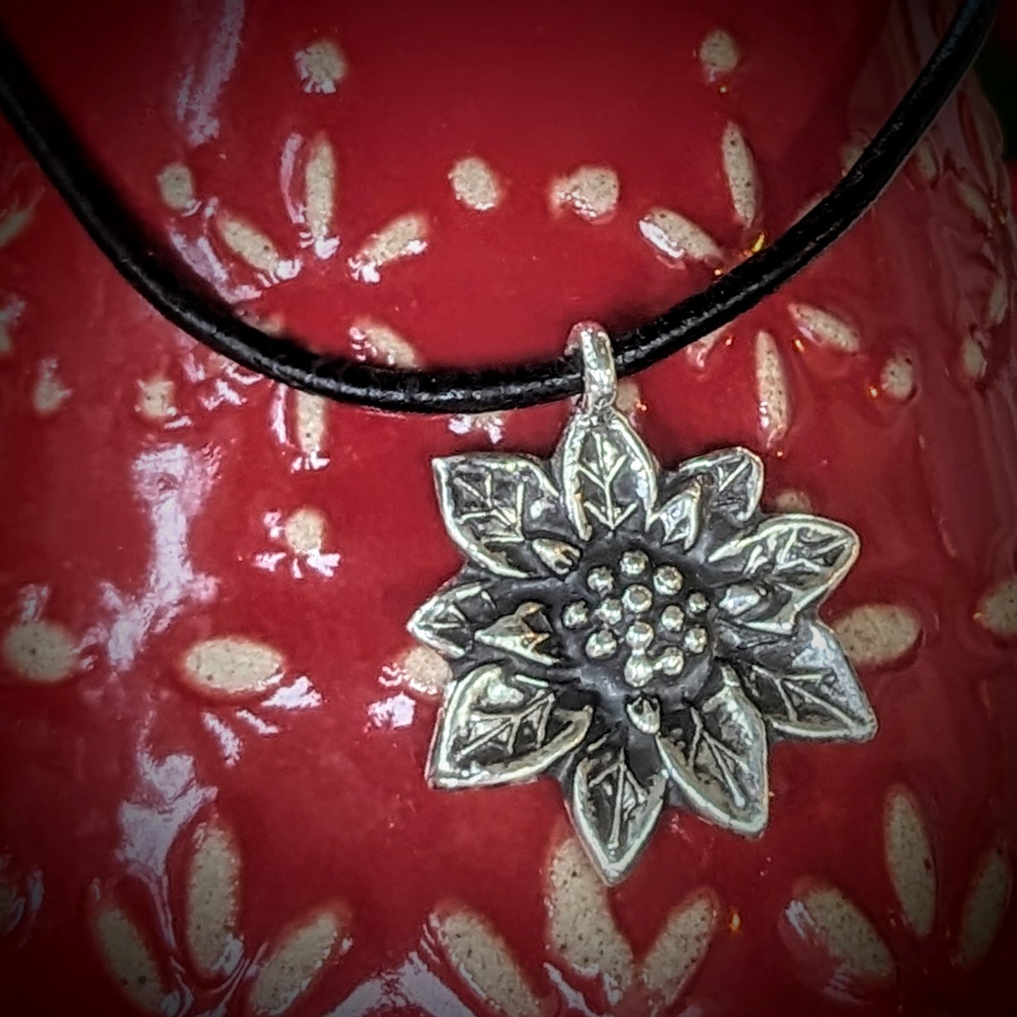 Holiday Silver Poinsettia Pendant on Leather Cord